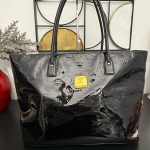 MCM Glossy Black Tote with Gold Accents